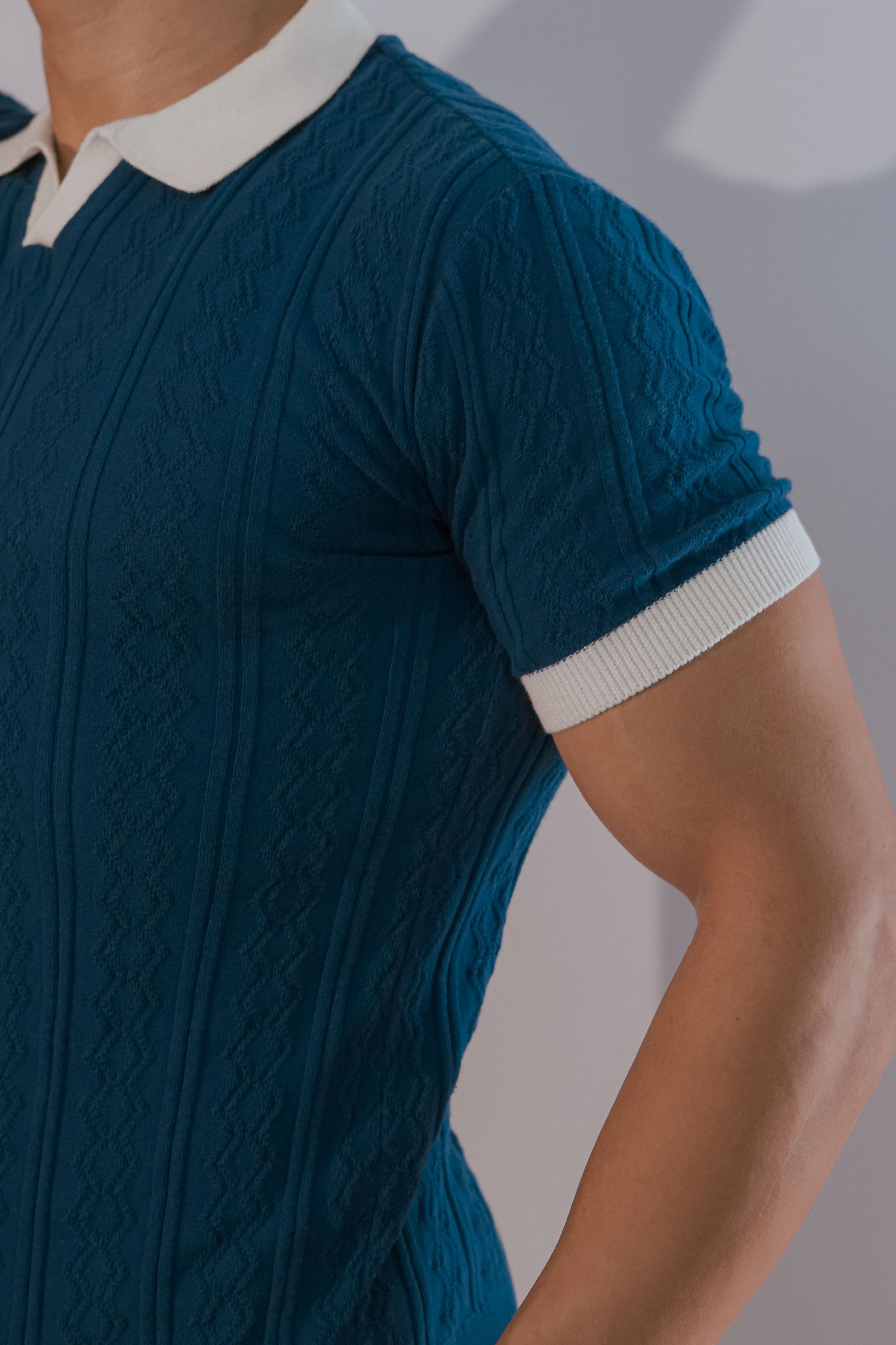 Polo à maille torsadée bleu marine