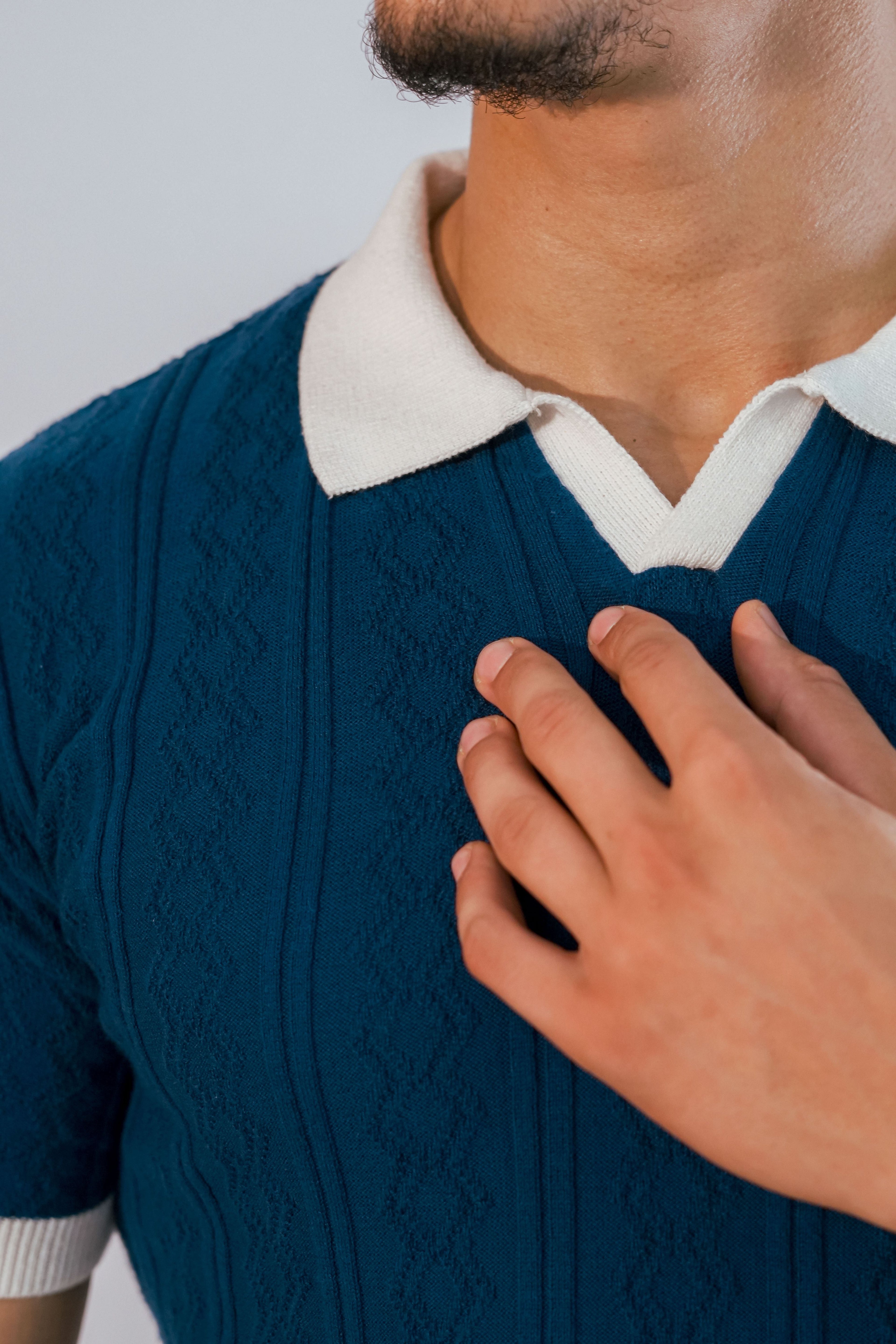 Polo à maille torsadée bleu marine