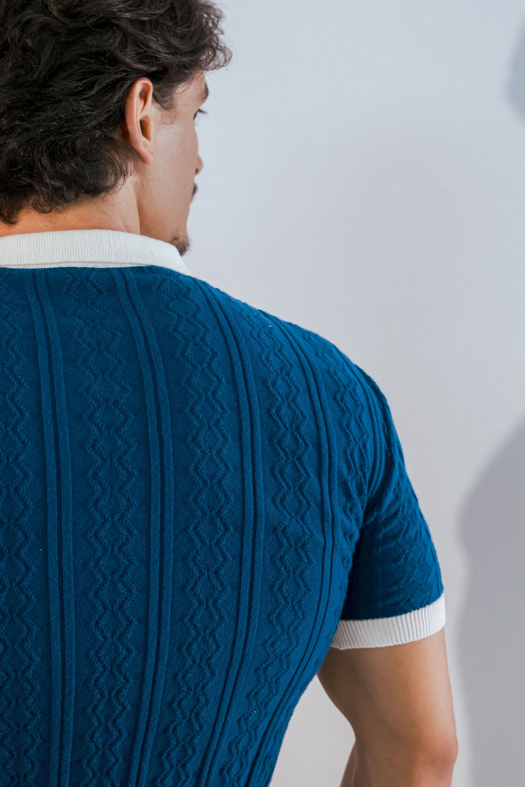 Polo à maille torsadée bleu marine