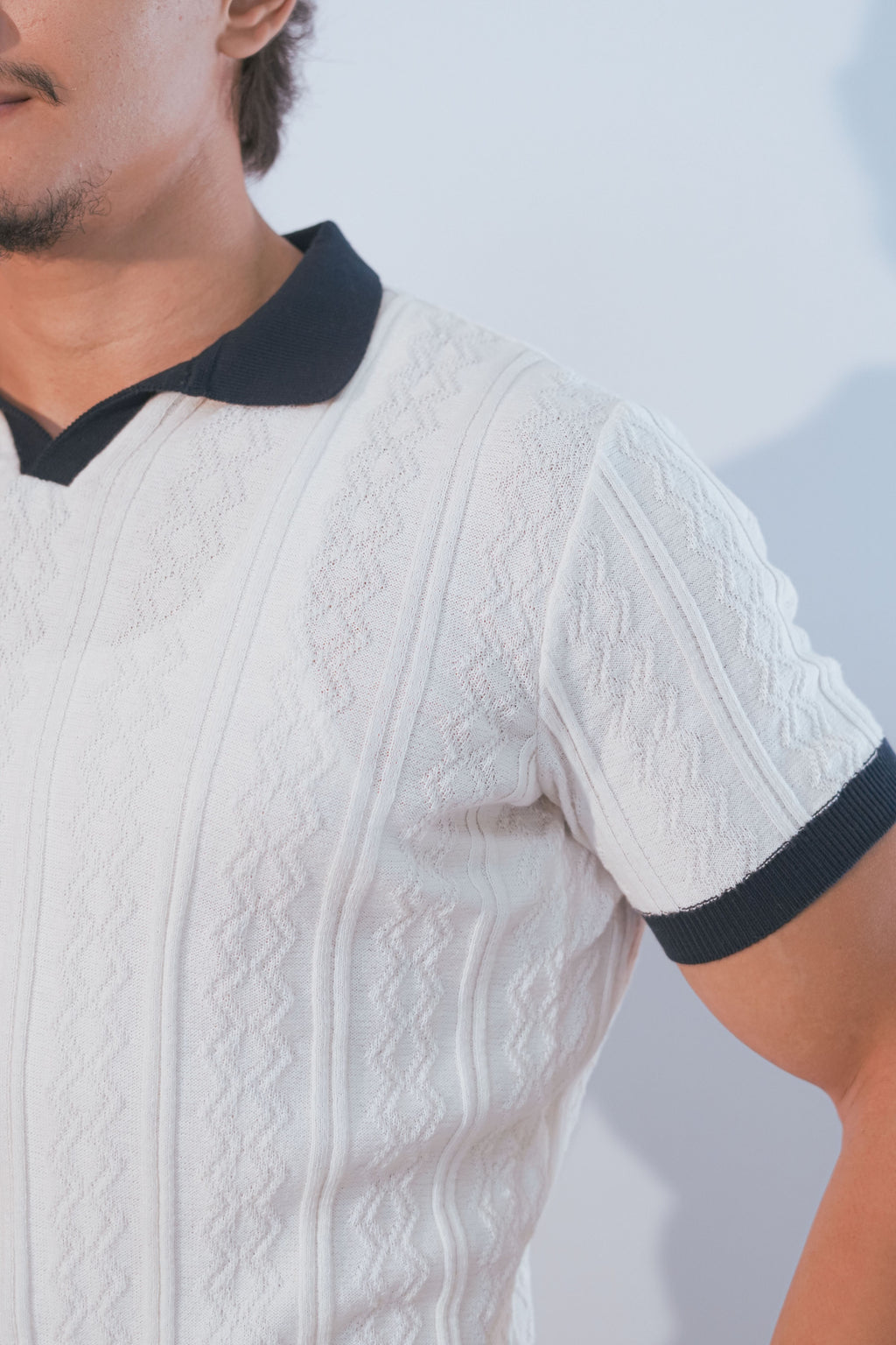 Polo à maille torsadée écru