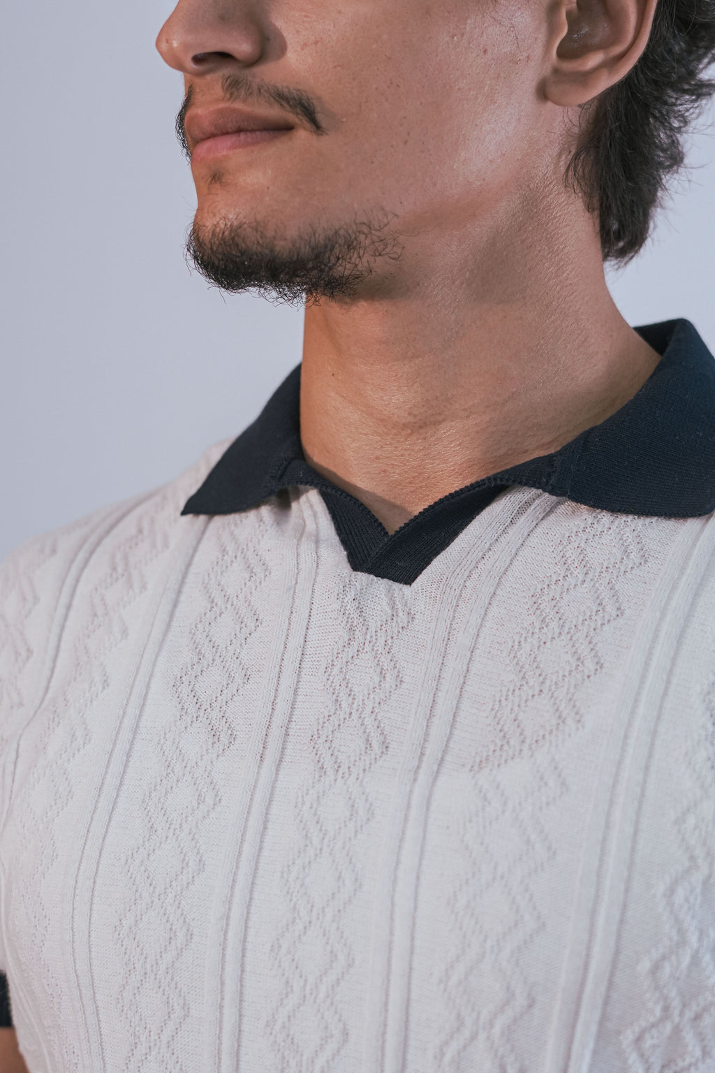 Polo à maille torsadée écru